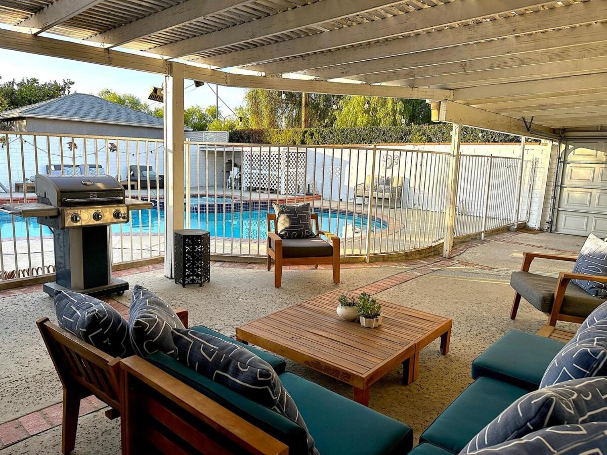 Tranquil Poolside Oasis With Bbq And Serene Ambiance
