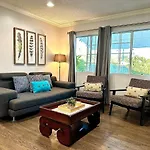 Tranquil Poolside Oasis With Bbq And Serene Ambiance